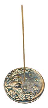 Decorative moon and stars incense burner featuring an intricate design with a sun motif