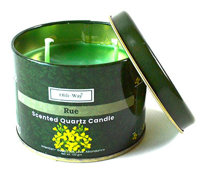 Herbal intention candle for abundance in green scented quartz tin with yellow floral design