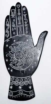 Black palmistry incense burner featuring intricate sun and symbol designs for spiritual use