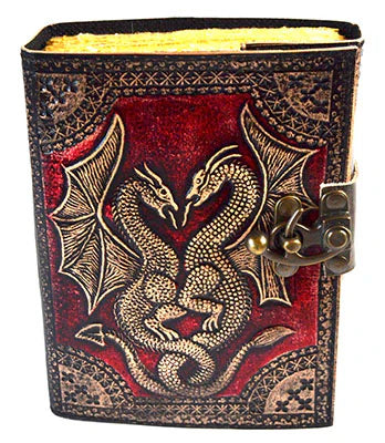 Handmade leather journals featuring an embossed double dragon design and secure metal clasp closure