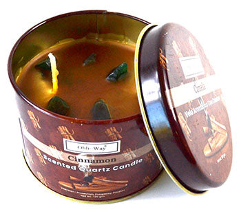 Cinnamon quartz candle tin with green quartz crystals in a brown scented candle container