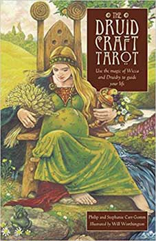 The Druid Craft Tarot deck book cover featuring a woman in green sitting on a wooden throne outdoors
