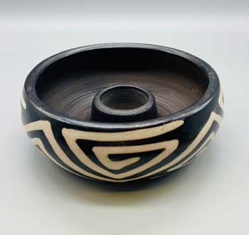 Ceramic Peruvian palo santo burner with intricate tribal designs for incense burning