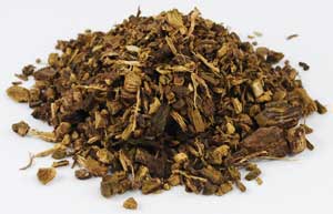 Dried yellowdock root cut from Wolf Moon Azure, featuring coarse, natural herbal texture.