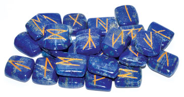 Lapis rune set featuring polished blue stones with orange etched symbols for divination and spiritual guidance