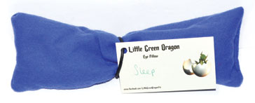 Soft blue sleep eye pillow for relaxation with tag, designed for soothing comfort during rest