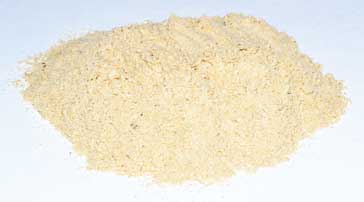 Organic ashwagandha root powder by Wolf Moon Azure in a fine, golden-brown texture for health benefits