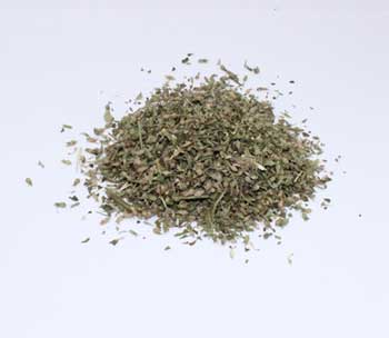 Dried catnip herbal cut from Wolf Moon Azure in a mound showcasing its natural green color and texture