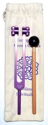 Purple crown chakra tuning fork set with mallet, stored in a soft bag for sound healing