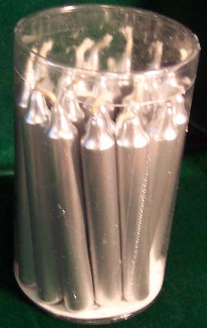 Silver spell candles for meditation packed in a clear container for focused relaxation and rituals