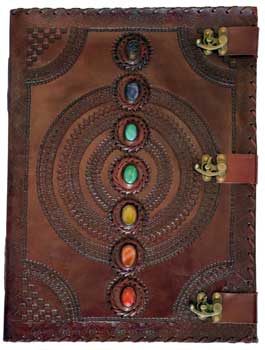 7 stone leather journal with latches featuring intricate designs and colorful stone accents