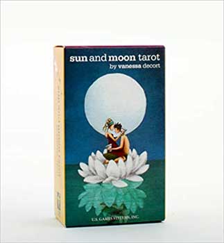 Sun and Moon tarot deck box featuring artwork of a figure sitting on a lotus flower under a full moon