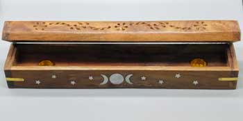 Handcrafted wooden triple moon incense holder with intricate designs for aromatherapy